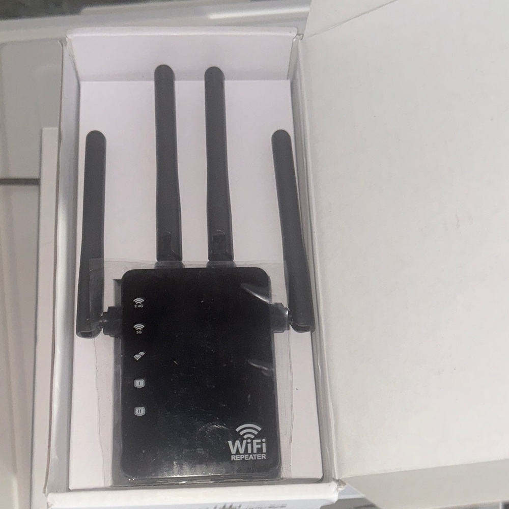Sleek Black WiFi Repeater with Antennas